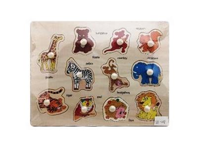 Hand grasping the wooden animal puzzles - OBL806221