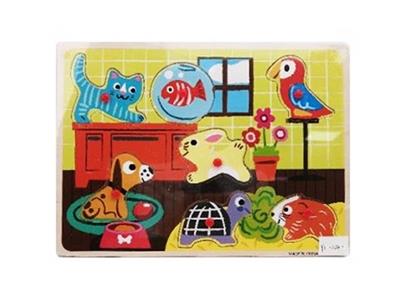 Hand grasping the wooden animal puzzles - OBL806226