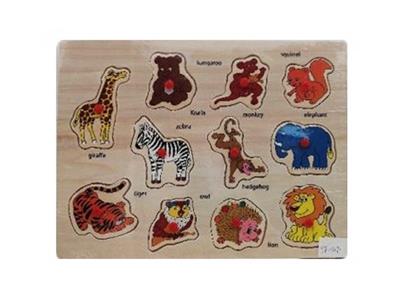 Hand grasping the wooden animal puzzles - OBL806230