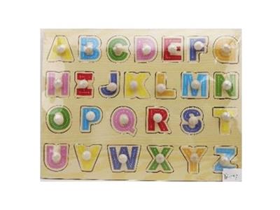 Puzzle hand grasping the wooden capital letters - OBL806366