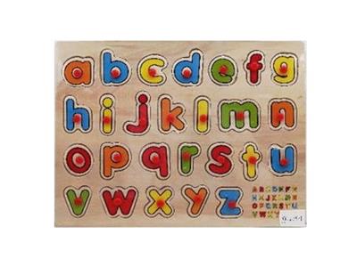 Hand grasping the wooden lowercase letter puzzles - OBL806373