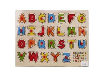 Puzzle hand grasping the wooden capital letters - OBL806374