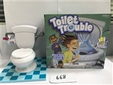 OBL673262 - Board game host to the toilet