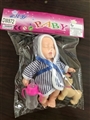 OBL733712 - Six inches sleeping baby With a bottle a pony