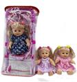 OBL867603 - 13 INCH ENAMEL DOLL WITH FOUR TONE IC AND IRON TROLLEY