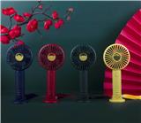 OBL882329 - THE NATIONAL TIDE IS BLOWING UP WITH A HAND-HELD FAN
